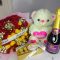 Celebrate love and joy with a colorful rose bouquet gift set featuring a cuddly bear and Ferrero Rocher.