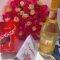 congratulatory flower gift Nairobi,roses with wine and chocolate Kenya,graduation gift delivery,pink rose celebration combo,promotion flowers Nairobi