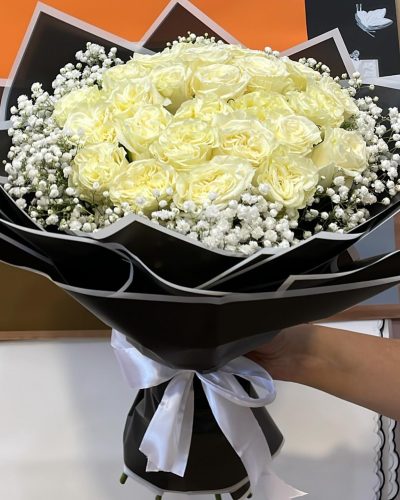 white rose bouquet Nairobi,sympathy flower delivery Kenya,elegant funeral flowers,baby’s breath and roses combo,condolence flowers Nairobi,thank you bouquet white roses