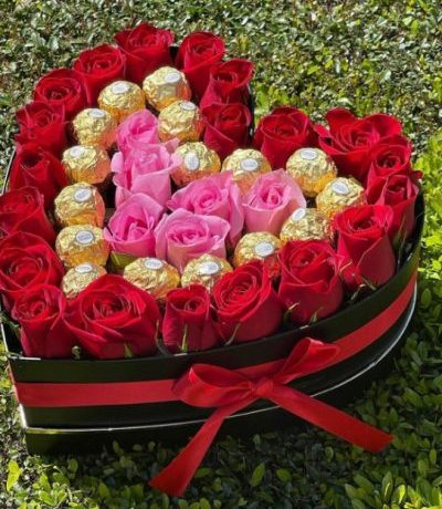 heart rose box with chocolates,romantic flower gift Kenya,red and pink rose bouquet Nairobi,Ferrero Rocher flower box,heart shaped gift for her,love flower box delivery,flower and chocolate combo Kenya
