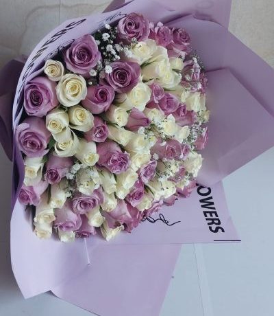 Lavender and ivory rose bouquet for birthdays,weddings,and gifts in Nairobi Kenya.