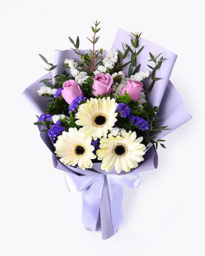 lilac flower bouquet,pastel bouquet Kenya,roses and gerberas,flower delivery Nairobi,elegant floral gifts,mixed flower bouquet,sympathy flowers,soft color flowers