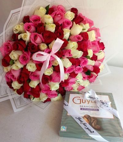 mixed rose bouquet Nairobi,Belgian chocolate and flowers combo,birthday gift flowers Kenya,romantic flower delivery,GuyLian chocolate gift Nairobi