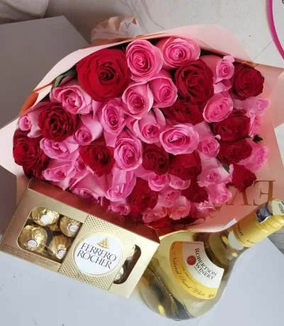 rose and wine gift Nairobi,romantic gift set Kenya,roses with chocolate and wine,Ferrero bouquet Kenya,luxury anniversary gift Nairobi