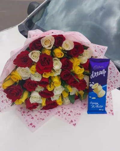 red yellow white rose bouquet Nairobi,friendship flower gift Kenya,birthday bouquet with chocolate,Cadbury Dream chocolate combo,thank you roses Nairobi