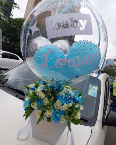 baby boy balloon gift,newborn flower box,baby shower gifts Kenya,personalized baby gifts Nairobi,welcome baby boy flowers,hot-air balloon flower box,baby boy gift delivery,baby blue floral arrangement